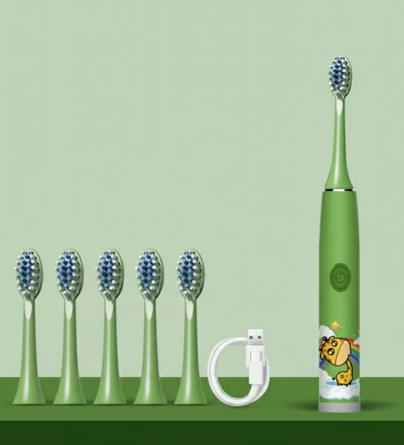 Brosse à dents électrique verte pour enfant avec un assortiment d'embouts