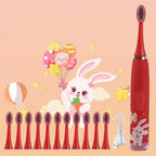 Brosse à dents électrique rouge pour enfant avec un assortiment d'embouts